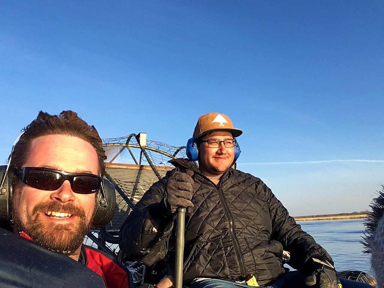 Sunny Boy Carriere guiding Dr. Strickert through the Saskatchewan River Delta via Airboat.